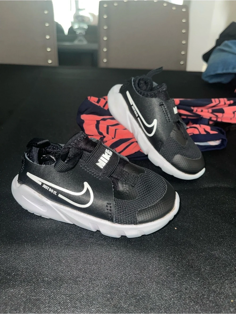 Nike Kids Black and White Slip-On Sneakers with Swoosh